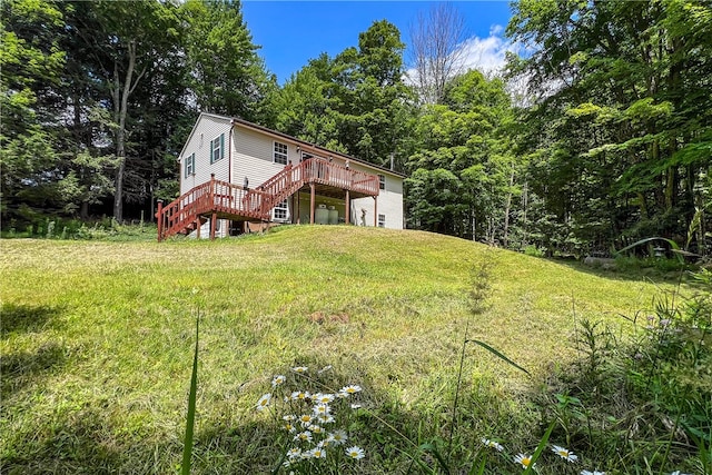 view of yard featuring a wooden deck