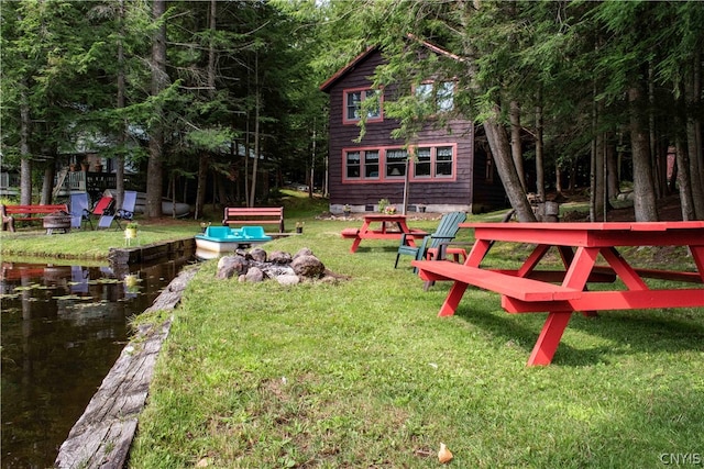 view of yard with a water view