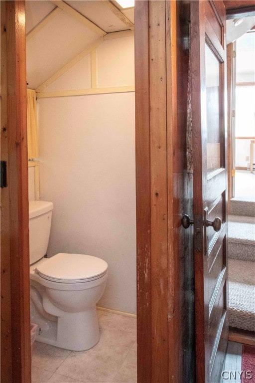 bathroom with tile patterned floors and toilet