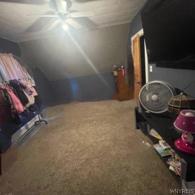 81 Moreland St, Buffalo, NY 14206 - carpeted bedroom with lofted ceiling and a ceiling fan