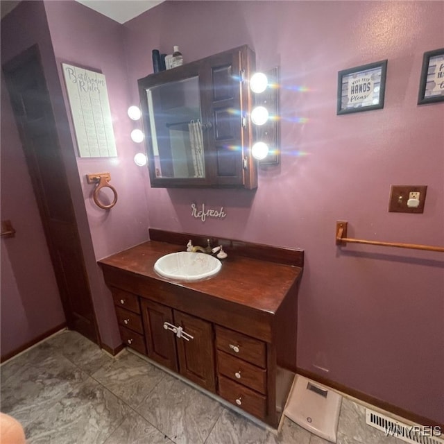 bathroom with vanity and tile patterned floors