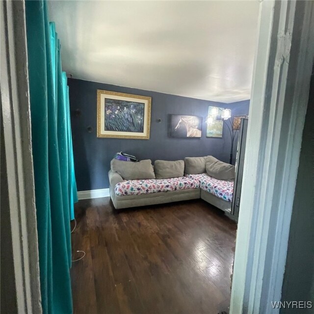 81 Moreland St, Buffalo, NY 14206 - living area with baseboards and dark wood-style floors