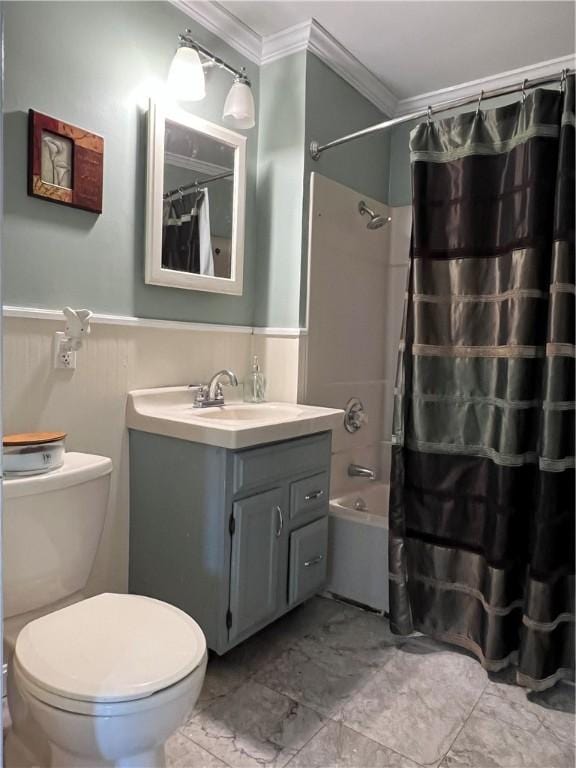 full bath featuring vanity, shower / bath combo, ornamental molding, wainscoting, and toilet