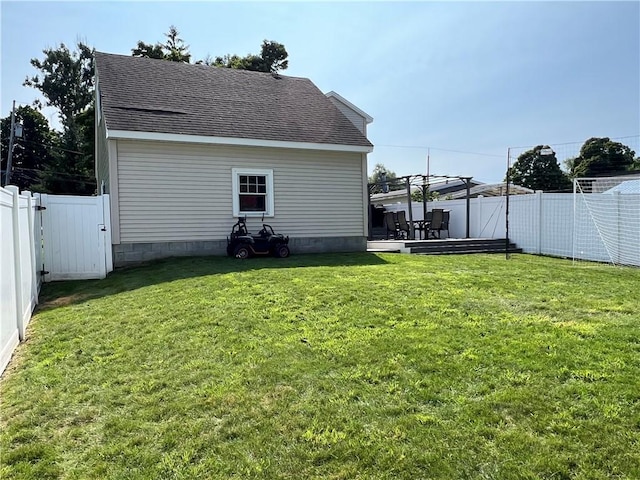 view of yard featuring a deck and a fenced backyard