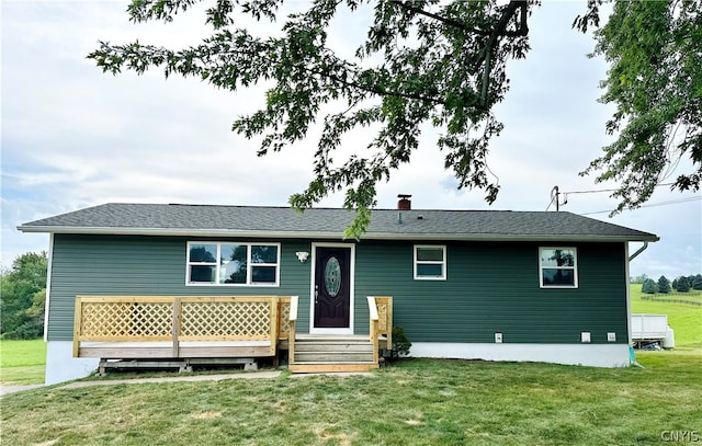 view of front of home with a front lawn