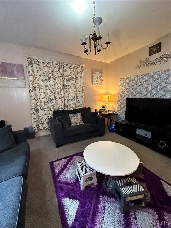 living room with carpet and an inviting chandelier