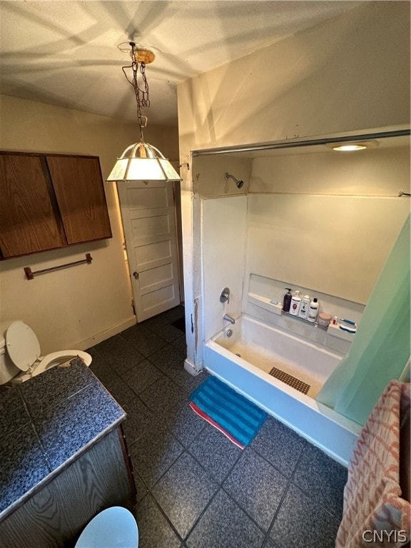 full bathroom featuring tile patterned floors, vanity, and toilet