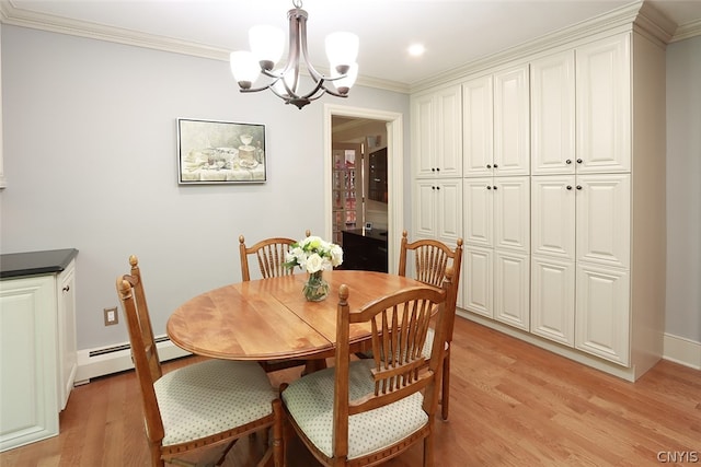 dining room with light hardwood / wood-style floors, a baseboard radiator, a chandelier, and ornamental molding