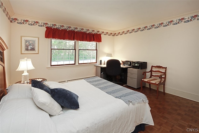 bedroom with a baseboard heating unit, crown molding, and dark parquet floors