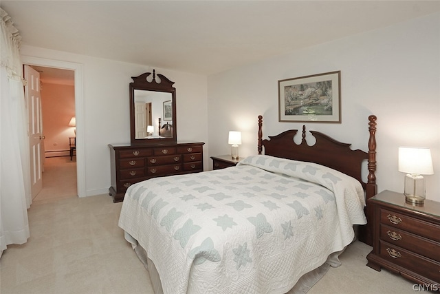 bedroom with light carpet and a baseboard radiator