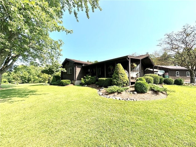 view of property exterior with a yard