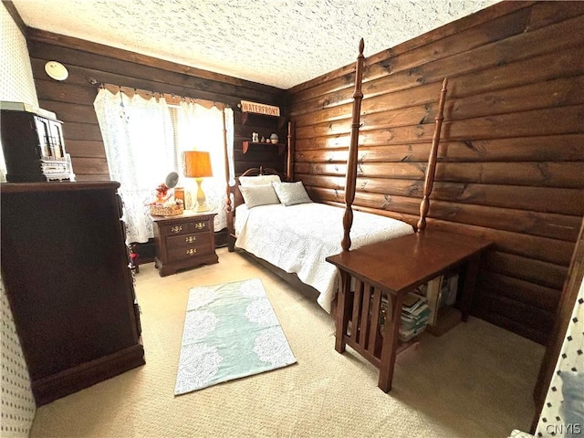 bedroom featuring light carpet, log walls, and a textured ceiling