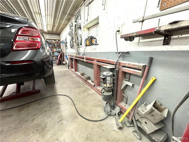 garage with a workshop area