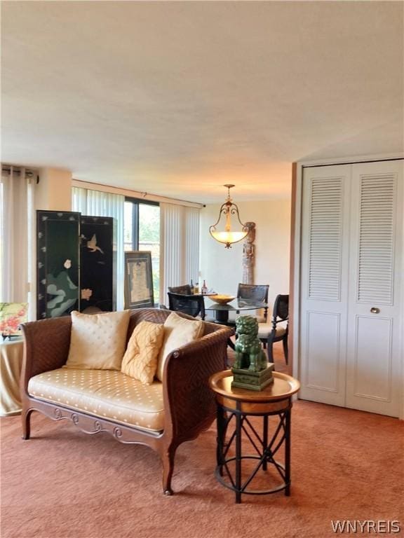 living area with light colored carpet