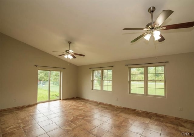 unfurnished room with light tile patterned flooring, ceiling fan, lofted ceiling, and a healthy amount of sunlight