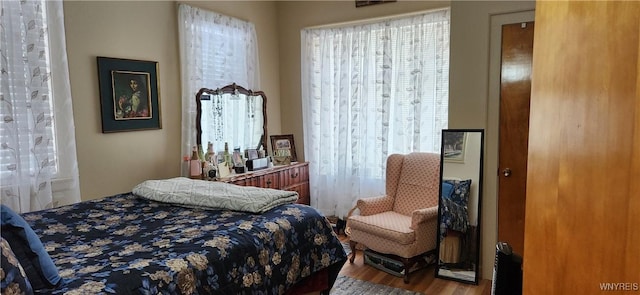 bedroom featuring hardwood / wood-style floors