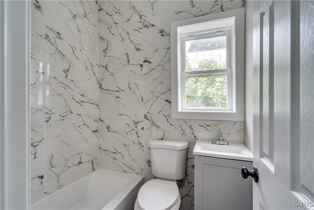 full bathroom featuring vanity, shower / tub combination, toilet, and tile walls