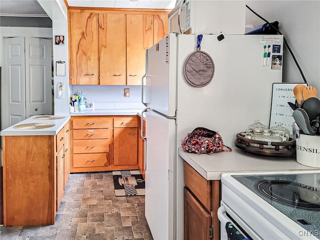 kitchen with tile patterned floors and range