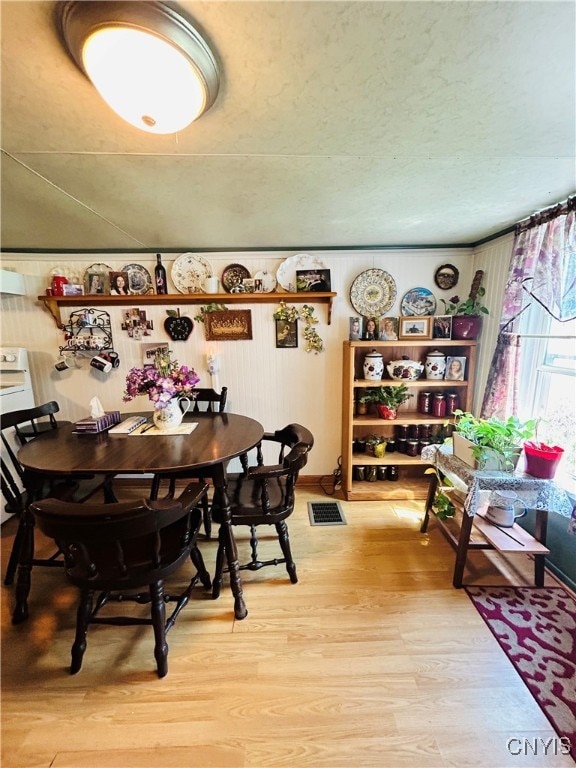 dining room featuring light hardwood / wood-style floors