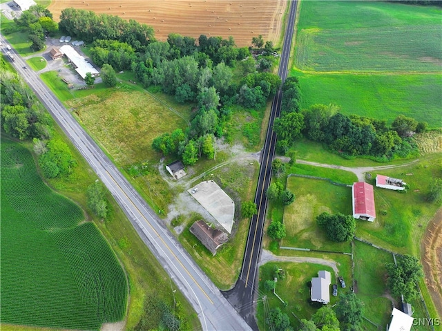 bird's eye view with a water view and a rural view