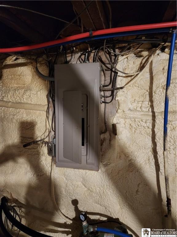 utility room featuring electric panel