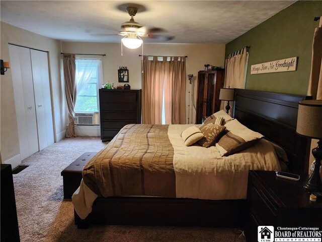 carpeted bedroom featuring ceiling fan
