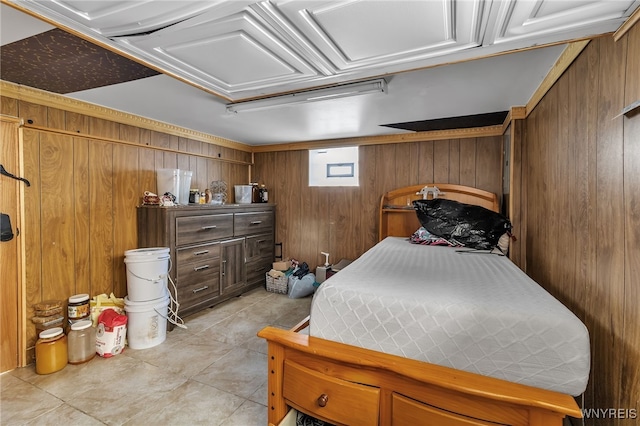 bedroom with wood walls