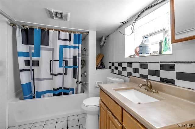 full bathroom featuring toilet, tile walls, vanity, shower / bath combo, and tile patterned flooring