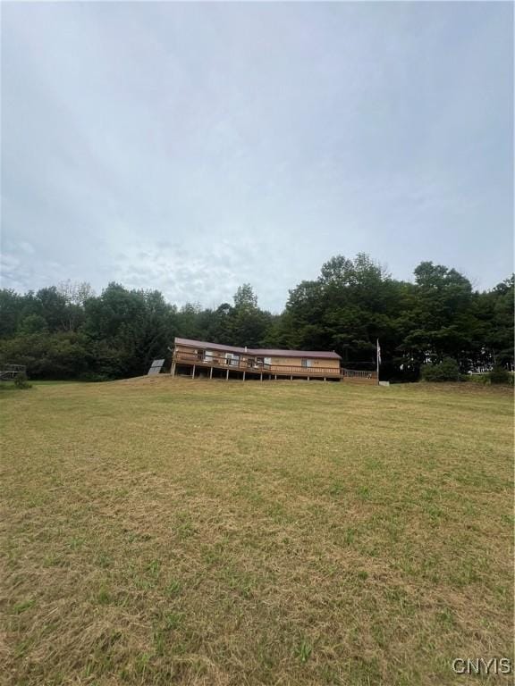 view of yard with a rural view