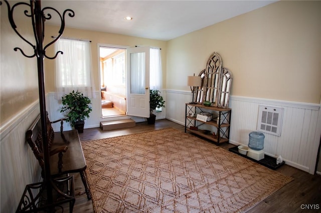 foyer entrance with dark wood-type flooring