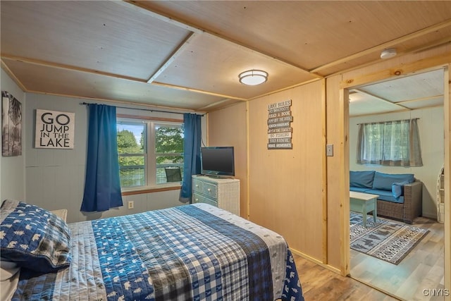 bedroom featuring wood finished floors