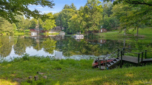 exterior space with a water view