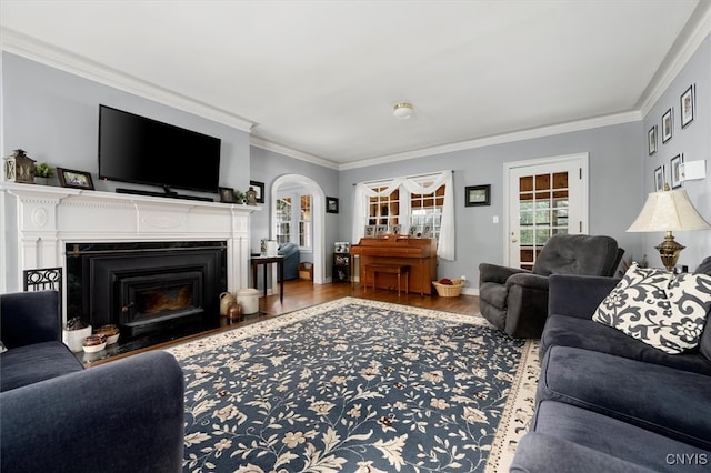 living room featuring hardwood / wood-style floors and ornamental molding