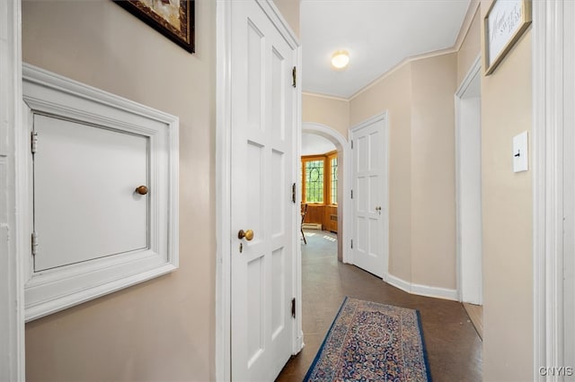 hallway featuring crown molding