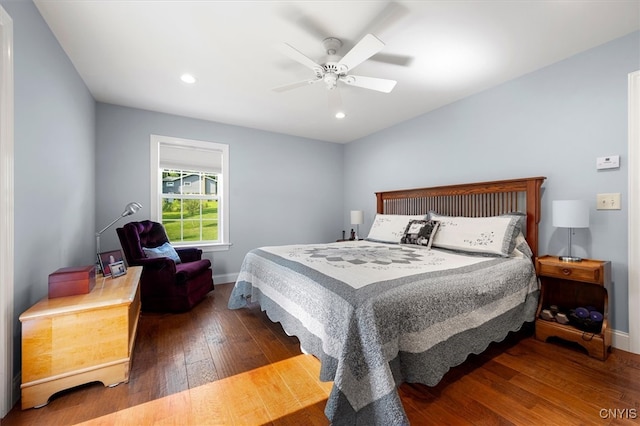 bedroom featuring hardwood / wood-style flooring and ceiling fan