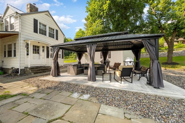 view of patio / terrace featuring a gazebo and an outdoor living space