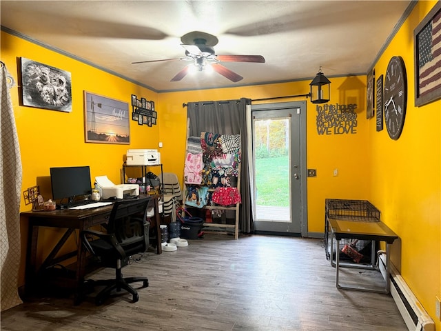 office with ceiling fan, hardwood / wood-style floors, crown molding, and a baseboard heating unit