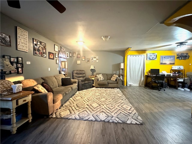 living room with ceiling fan and hardwood / wood-style flooring