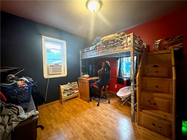 office space featuring light hardwood / wood-style floors and cooling unit