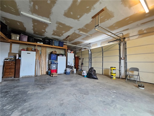 garage featuring white refrigerator