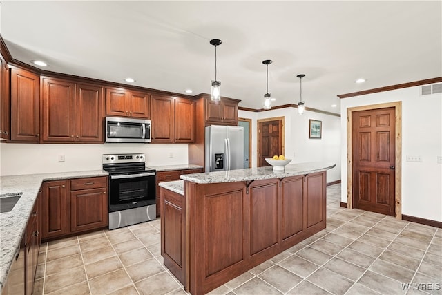 kitchen with decorative light fixtures, appliances with stainless steel finishes, crown molding, a center island, and light stone counters