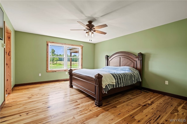 bedroom featuring light wood-type flooring and ceiling fan