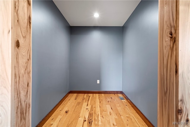 empty room featuring hardwood / wood-style flooring