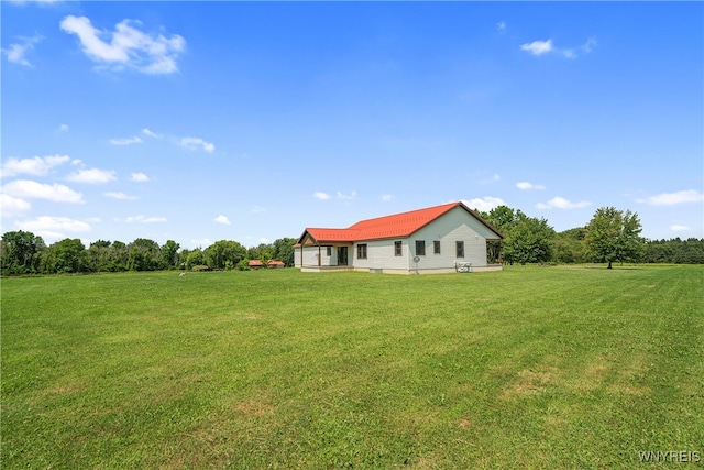 view of yard with a rural view