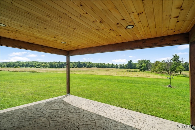 view of patio / terrace with a rural view