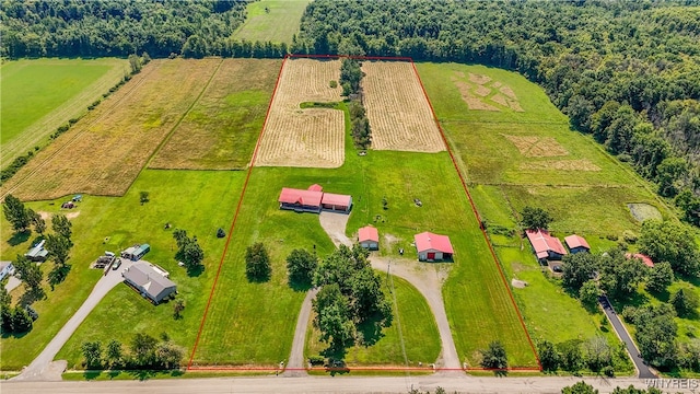 birds eye view of property with a rural view