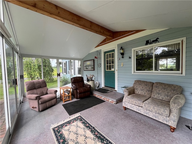 sunroom with lofted ceiling with beams