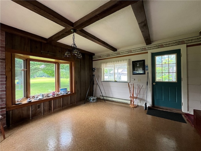 interior space featuring beam ceiling, a notable chandelier, and a baseboard radiator