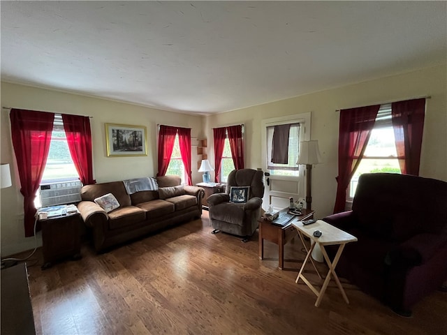 living room with hardwood / wood-style flooring and cooling unit