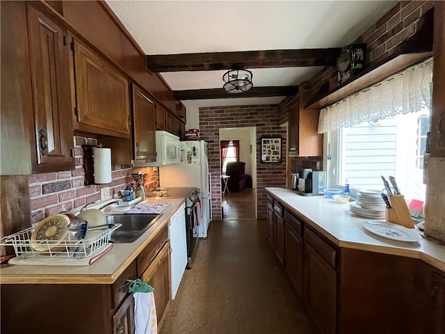 kitchen featuring sink, beamed ceiling, white appliances, and brick wall